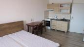 Pron�jem za��zen� garsonky s�dli�t� M�r �. Krumlov